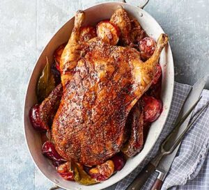 roast spiced duck with plums