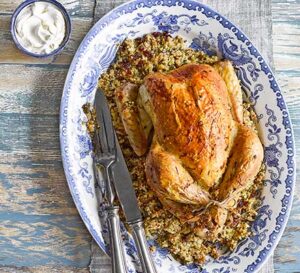 saffron butter chicken with date couscous stuffing 1